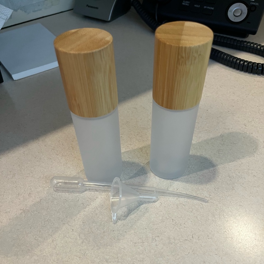 2 50 ml (1.6 oz) lotion bottles never used